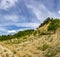 A mound formed by small piles of crushed limestone and washed away by rains