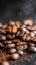 A mound of singleorigin coffee beans emitting smoke on a wooden table