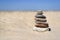 A mound of stones on the beach on a sunny day in summer