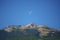 Mount Alice summit in the Colorado Rockies with the Moon