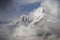 Mount Ama Dablam in The Stormy Clouds. Himalaya Mountain Range.