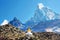 Mount Ama Dablam with stupa near Pangboche village and beautiful cloudy sky - way to mount Everest base camp - Khumbu valley -
