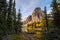 Mount Assiniboine with rocky mountains in autumn forest on Sunburst Lake at Provincial park