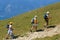 Mount Baldo, Italy - August 15, 2017: Walking family climbing the mountain.