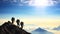 Mount with clouds and silhouette of three hikers