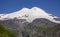 Mount Elbrus. Landscape view in the south-east of mount from Cheget mount. July. Kabardino-Balkaria region, Russia.