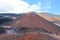 Mount Etna, Sicily, Italy - April 9th 2019: Hikers walking on the Silvestri craters on the Mount Etna