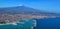 Mount Etna towers over Catania, Sicily, Italy
