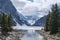 Mount fairview, partly frozen lake, with reflection in water. Lake Louise Banff National Park, Alberta Canada