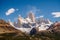 Mount Fitz Roy in the Glacier National Park on a cloudy day with some clouds. El Chalten