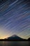 Mount Fuji, Lake Shojiko and star trails of winter stars