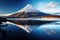 Mount Fuji reflected in Lake Kawaguchiko, Yamanashi, Japan, Volcanic mountain in morning light reflected in calm waters of lake,