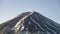 Mount Fuji with less snow on top of its peak