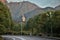 MOUNT JIUHUA, ANHUI PROVINCE, CHINA â€“ CIRCA OCTOBER 2017: A monk walks in front of statue of Dizang Pusa