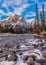 Mount Kidd, a mountain in Kananaskis in the Canadian Rocky Mountains, Alberta and the Kananaskis River in winter