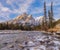 Mount Kidd, a mountain in Kananaskis in the Canadian Rocky Mountains, Alberta and the Kananaskis River in winter