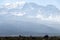 Mount Kilimanjaro with native porters carrying pack on their heads