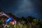 Mount Kinabalu with light trail, night sky and stars