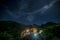 Mount Kinabalu with light trail, night sky and stars