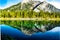 Mount Lorette and Skogan Peak relected in Mount Lorette Ponds Bow Valley Provincial Park.dng