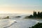 Mount maunganui main beach shrouded in sea haze caused by large surf from Cyclone Cody