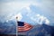 Mount McKinley peak and US flag, Alaska, US