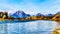 Mount Moran and surrounding Mountains in the Teton Mountain Range of Grand Teton National Park with Kayakers on the Snake River