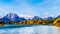 Mount Moran and surrounding Mountains in the Teton Mountain Range of Grand Teton National Park with Kayakers on the Snake River