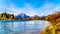 Mount Moran and surrounding Mountains in the Teton Mountain Range of Grand Teton National Park with Kayakers on the Snake River