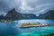 Mount Olstind above the Sakrisoy fishing village, Lofoten, Norw