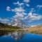 Mount psish peak reflected in a quiet mountain lake