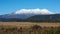 Mount Ruapehu covered in snow in the distance in New Zealand