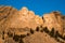 Mount Rushmore faces of the presidents at sunrise in Black Hills of South Dakota