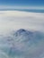 Mount Shasta aerial view from airplane, Northern California Cascade Range fog smoke from wildfires, forest fires. Siskiyou County,