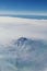 Mount Shasta aerial view from airplane, Northern California Cascade Range fog smoke from wildfires, forest fires. Siskiyou County,