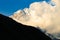 Mount Shkhara peak covered in clouds. Greater Caucasus, Georgia.