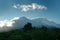 Mount Taranaki, volcano in the north island of New Zealand, mostly the peak is covered by clouds