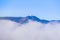 Mount Umunhum rising above the clouds, south San Francisco bay area, Santa Clara county, California
