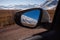 Mount Vettore seen from the mirror of the car, Piangrande, Castelluccio di Norcia, Italy