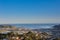 Mount Victoria lookout, wellington city view with cargo ship sailing in the blue ocean in the background.