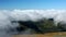 Mount Washington peak stands above a thick layer of fluffy clouds