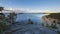 Mountain above Lake Ladoga in Karelia Summer morning. Northern landscape with forest beach and water.