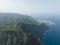 Mountain aerial of cliffs, high mountains, along the Atlantic coast line. Panoramic beautiful rough sea green rocky