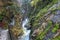 Mountain alpine autumn Wimbachklamm gorge and Wimbach stream with wooden path, Berchtesgaden national park, Alps, Bavaria, Germany