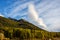 The mountain autumn landscape with colorful forest and high peaks lake Baikal