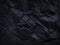 Mountain background texture. Close-up. Black rock background. Dark gray stone background.