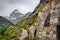 Mountain barn with alpine mountains