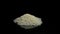 Mountain of basmati grains rice food turning on black background