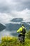 Mountain bike cyclist near fjord, Norway