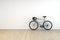 Mountain Bike on Empty Room with White Wall